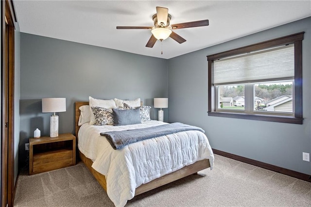 3426 Creek Ridge Dr, Eau Claire, WI 54703 - bedroom with a ceiling fan, baseboards, and carpet floors