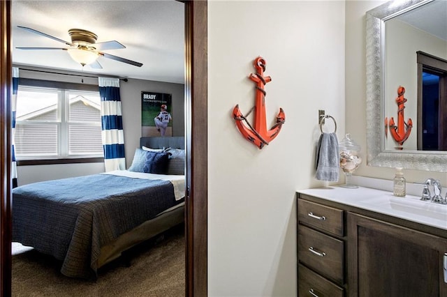 3426 Creek Ridge Dr, Eau Claire, WI 54703 - carpeted bedroom featuring ceiling fan and a sink