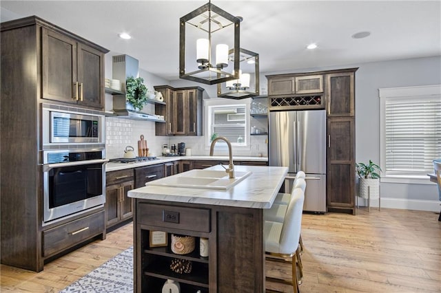 3426 Creek Ridge Dr, Eau Claire, WI 54703 - kitchen featuring open shelves, stainless steel appliances, wall chimney exhaust hood, and dark brown cabinets