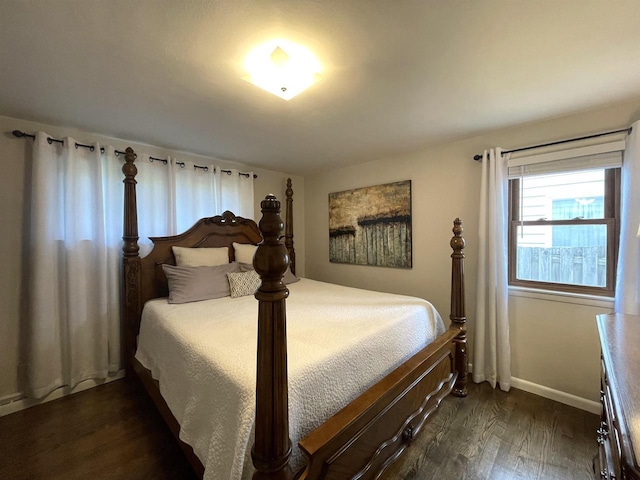 1139 Roscoe St, Green Bay, WI 54304 - bedroom featuring baseboards and dark wood-style flooring