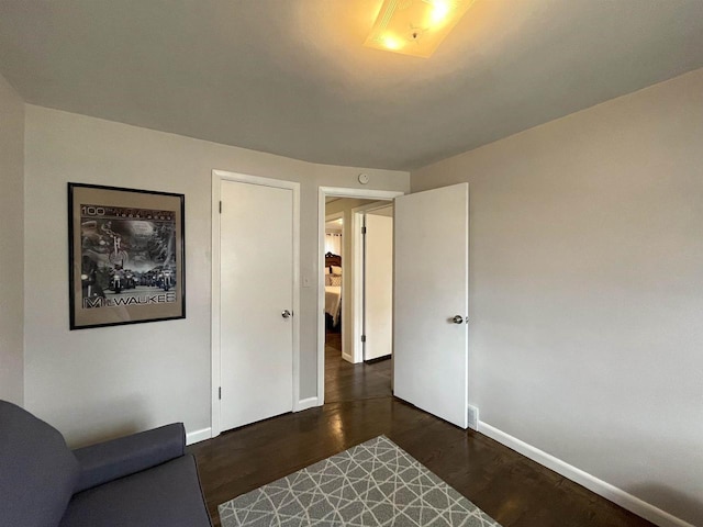 1139 Roscoe St, Green Bay, WI 54304 - bedroom featuring dark wood finished floors and baseboards