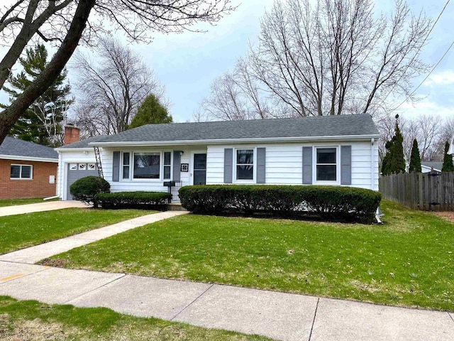 1139 Roscoe St, Green Bay, WI 54304 - ranch-style home featuring an attached garage, a chimney, a front yard, and fence