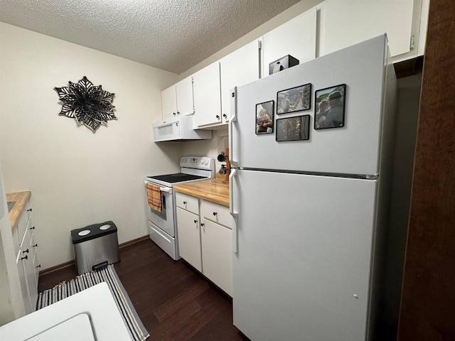 4 Hawthorn Trl, Wisconsin Dells, WI 53965 - kitchen featuring white cabinets, white appliances, a textured ceiling, and dark wood-type flooring