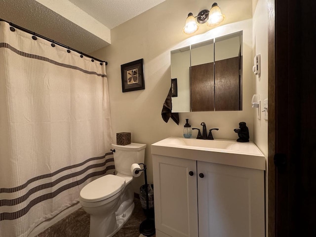 4 Hawthorn Trl, Wisconsin Dells, WI 53965 - bathroom featuring toilet, a textured ceiling, and vanity