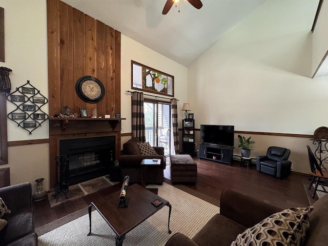 4 Hawthorn Trl, Wisconsin Dells, WI 53965 - living area with high vaulted ceiling, ceiling fan, a large fireplace, and wood finished floors