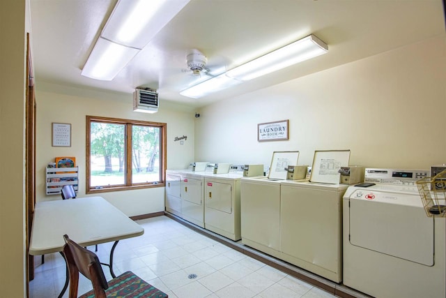 4 Hawthorn Trl, Wisconsin Dells, WI 53965 - common laundry area with baseboards and washing machine and clothes dryer