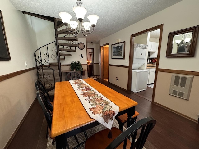 4 Hawthorn Trl, Wisconsin Dells, WI 53965 - dining room with an inviting chandelier, a textured ceiling, stacked washing maching and dryer, stairs, and dark wood-style floors