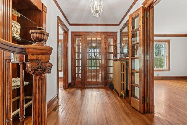 28094 E State Rd, Island Lake, IL 60042 - entryway featuring baseboards, french doors, wood finished floors, and crown molding