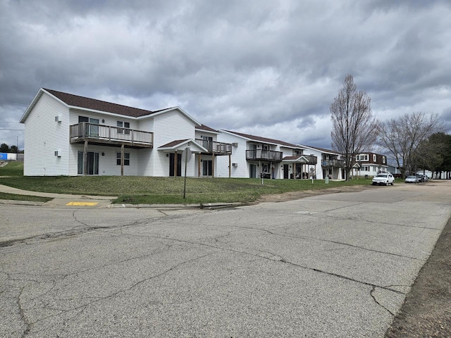 view of road with curbs and sidewalks