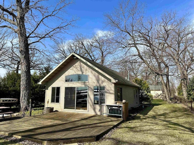 rear view of property with a deck