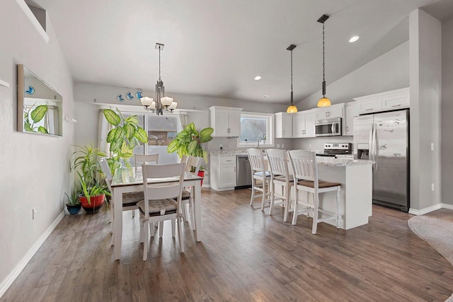 830 Roth Rd, De Pere, WI 54115 - dining area featuring lofted ceiling, dark wood finished floors, baseboards, a notable chandelier, and recessed lighting