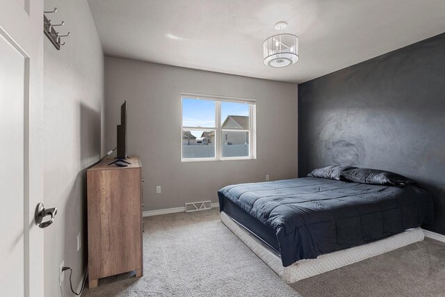 830 Roth Rd, De Pere, WI 54115 - carpeted bedroom with baseboards and visible vents