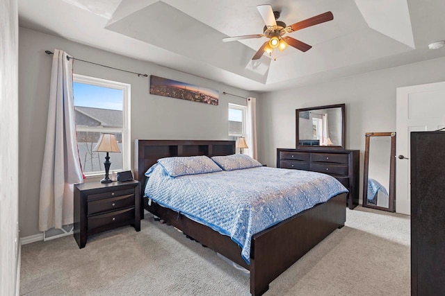 830 Roth Rd, De Pere, WI 54115 - carpeted bedroom with ceiling fan, baseboards, and a tray ceiling