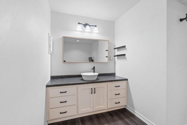 830 Roth Rd, De Pere, WI 54115 - bathroom with baseboards, wood finished floors, and vanity