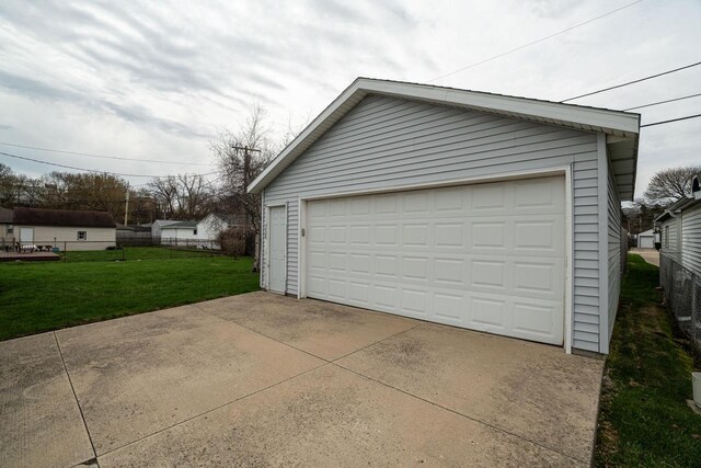 detached garage with fence
