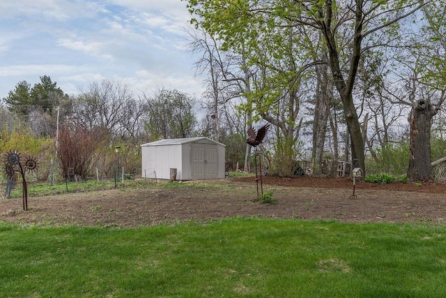 view of yard with an outbuilding and a storage unit