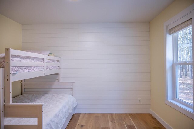 W3090 Yellow Banks Trl, Nekoosa, WI 54457 - bedroom with baseboards and wood finished floors
