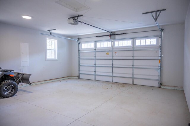 W3090 Yellow Banks Trl, Nekoosa, WI 54457 - garage with recessed lighting and a garage door opener