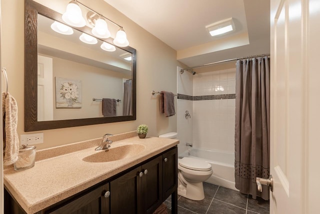 full bathroom featuring vanity, tile patterned floors, toilet, and shower / bath combo with shower curtain