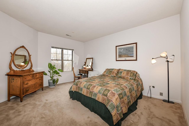 1300 N Prospect Ave Unit 120, Milwaukee, WI 53202 - bedroom with visible vents, baseboards, and carpet flooring