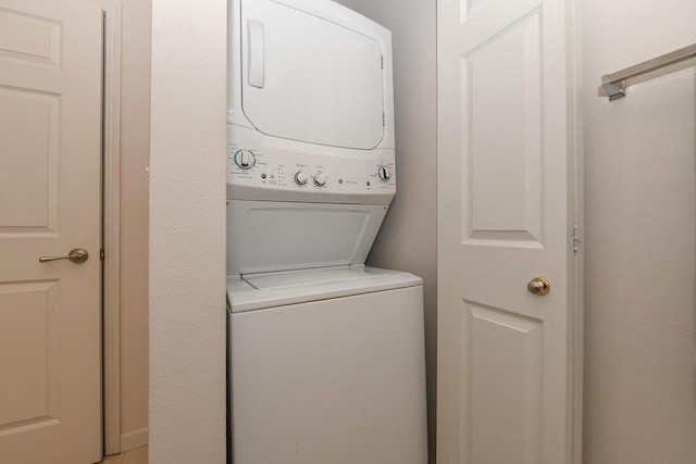 1300 N Prospect Ave Unit 120, Milwaukee, WI 53202 - washroom with stacked washer / drying machine and laundry area