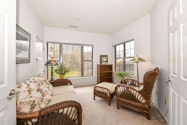 1300 N Prospect Ave Unit 120, Milwaukee, WI 53202 - living area with carpet floors, visible vents, and baseboards
