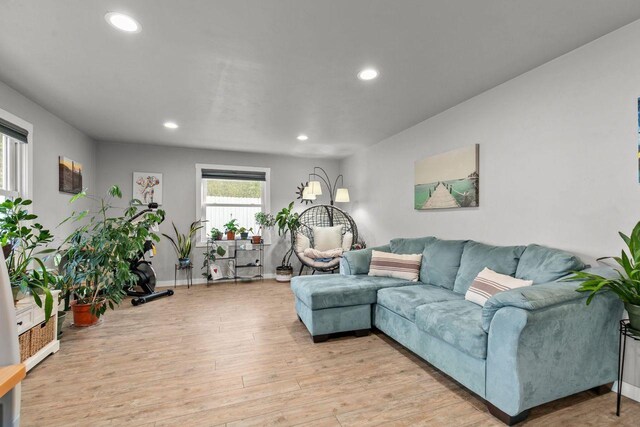 1442 Traeger St, Green Bay, WI 54304 - living area with light wood-style flooring, baseboards, and recessed lighting