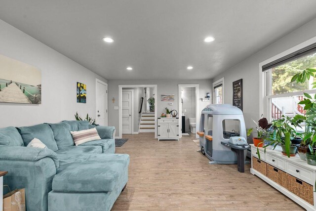 1442 Traeger St, Green Bay, WI 54304 - living area with light wood finished floors, recessed lighting, and stairs