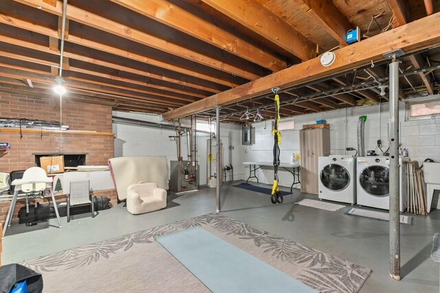 1442 Traeger St, Green Bay, WI 54304 - unfinished below grade area featuring washer and dryer, a heating unit, and electric panel