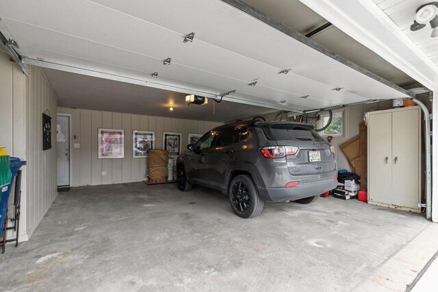 1442 Traeger St, Green Bay, WI 54304 - garage featuring a garage door opener