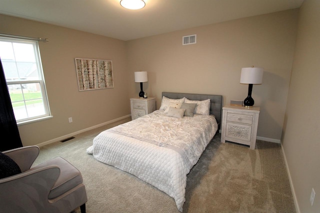 1677 Liatris Dr, Sun Prairie, WI 53590 - carpeted bedroom with baseboards and visible vents
