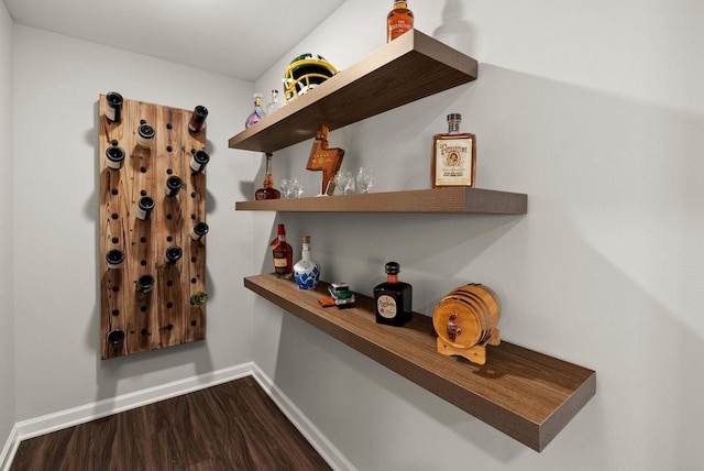 1677 Liatris Dr, Sun Prairie, WI 53590 - interior space featuring baseboards and dark wood-style floors
