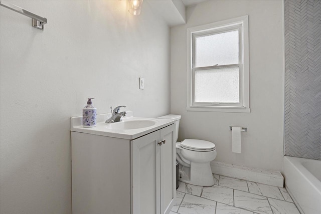 full bath featuring marble finish floor, vanity, and toilet