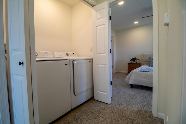 washroom with washing machine and clothes dryer, carpet flooring, baseboards, recessed lighting, and laundry area