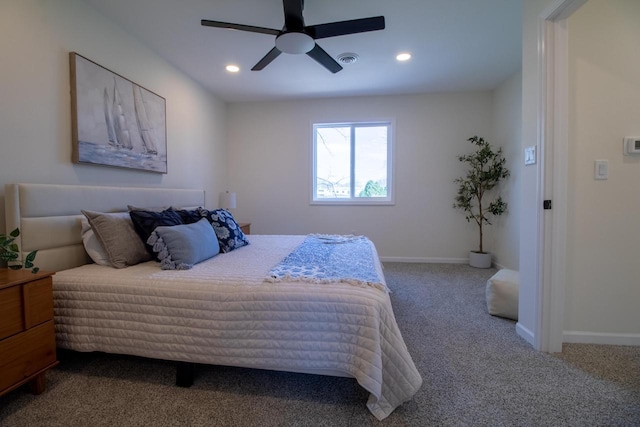 carpeted bedroom featuring recessed lighting, visible vents, a ceiling fan, and baseboards