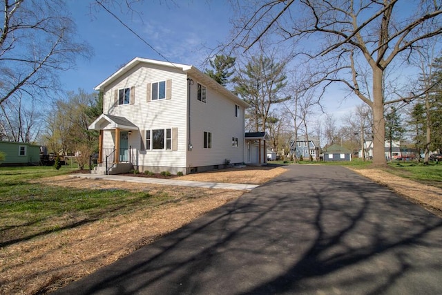 exterior space featuring driveway