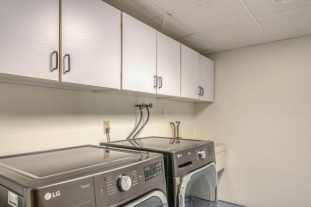 8226 Scott Rd, Cross Plains, WI 53528 - washroom with cabinet space and washer and clothes dryer
