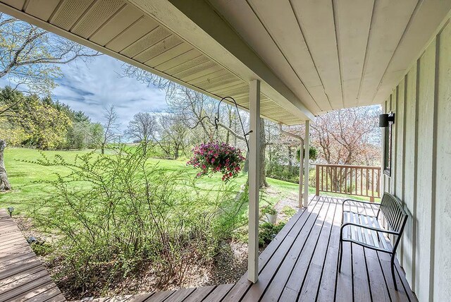 8226 Scott Rd, Cross Plains, WI 53528 - wooden deck with a lawn