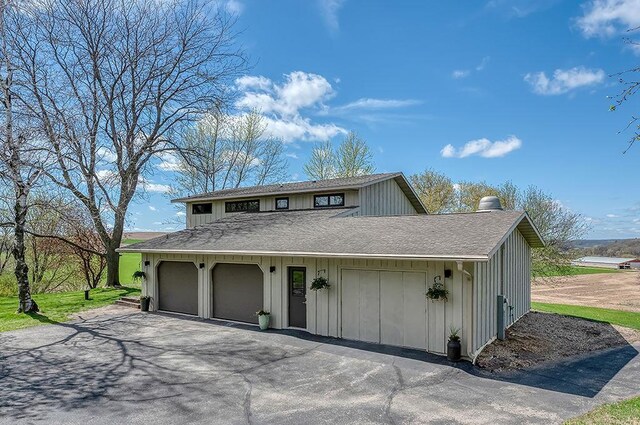 8226 Scott Rd, Cross Plains, WI 53528 - garage featuring aphalt driveway