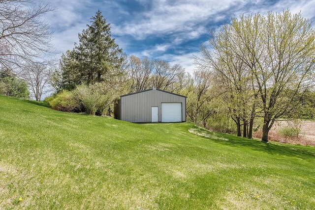 8226 Scott Rd, Cross Plains, WI 53528 - view of yard featuring a detached garage and an outdoor structure
