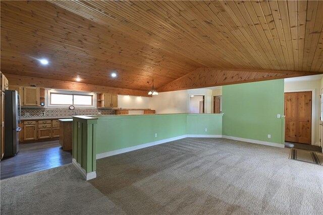 W3803 Church Rd, Sarona, WI 54870 - kitchen with freestanding refrigerator, dark colored carpet, wooden ceiling, and vaulted ceiling