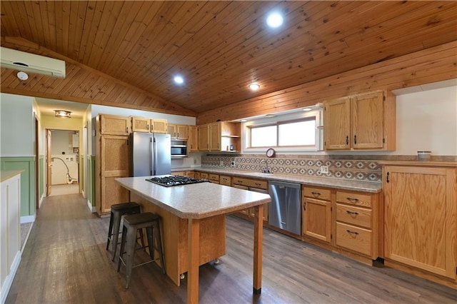 W3803 Church Rd, Sarona, WI 54870 - kitchen featuring a breakfast bar, wooden ceiling, lofted ceiling, appliances with stainless steel finishes, and a kitchen island