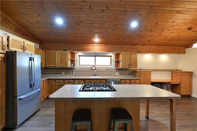 W3803 Church Rd, Sarona, WI 54870 - kitchen with open shelves, backsplash, a breakfast bar area, and stainless steel appliances