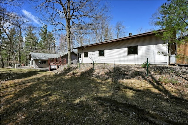 W3803 Church Rd, Sarona, WI 54870 - view of side of home with a wooden deck