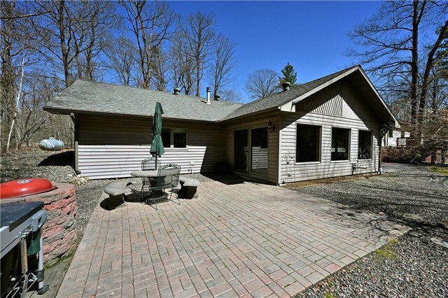 W3803 Church Rd, Sarona, WI 54870 - back of house featuring a patio area