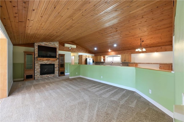 W3803 Church Rd, Sarona, WI 54870 - unfurnished living room with vaulted ceiling, baseboards, carpet, wooden ceiling, and a fireplace