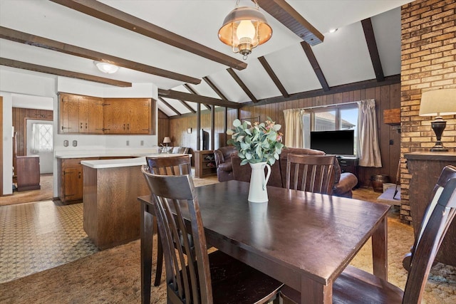 618 W Main St, Waterford, WI 53185 - dining space featuring wooden walls and light floors