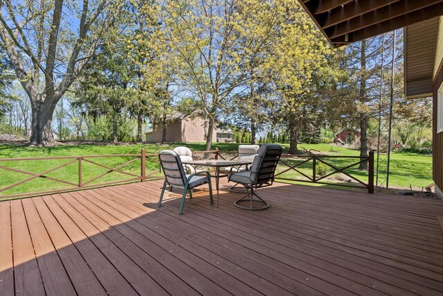 618 W Main St, Waterford, WI 53185 - wooden terrace with a lawn and outdoor dining space