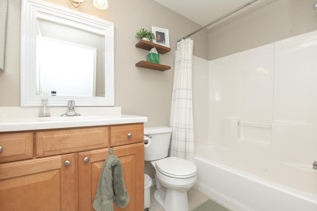 bathroom with shower / bath combo, vanity, and toilet