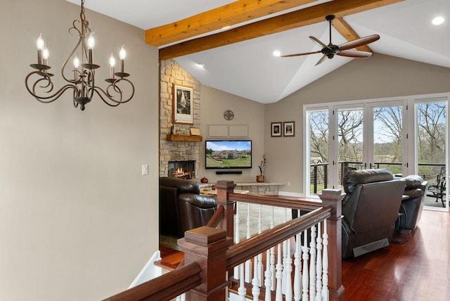 2575 Back Rd, Burlington, WI 53105 - living area featuring recessed lighting, beam ceiling, a fireplace, wood finished floors, and ceiling fan with notable chandelier